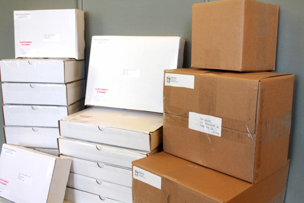 pile of Dismas Ministry mail